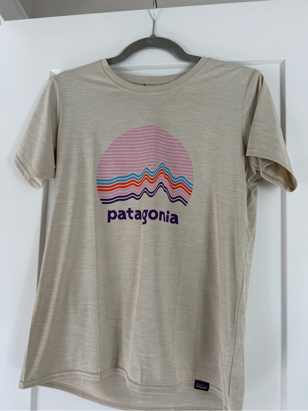 Patagonia Beige Kids Short Sleeve Tee with Pink & Purple Graphic